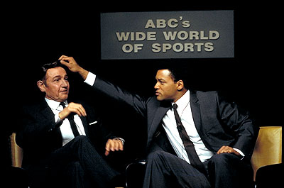 2Jon Voight as Howard Cosell