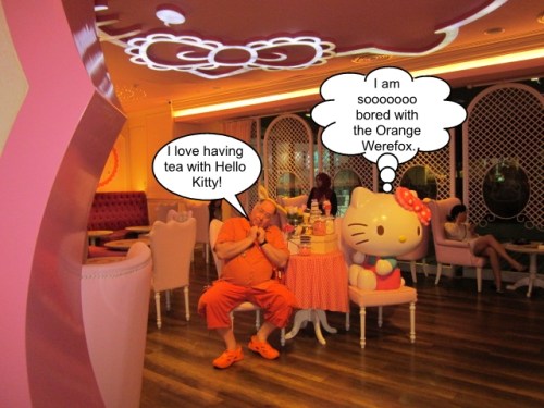 The Orange Werefox Meets Hello Kitty 1 Captioned